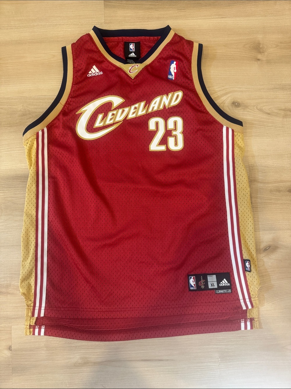 youth size XL (18-20) Adidas Cleveland Cavaliers Red and Gold Basketball Jersey